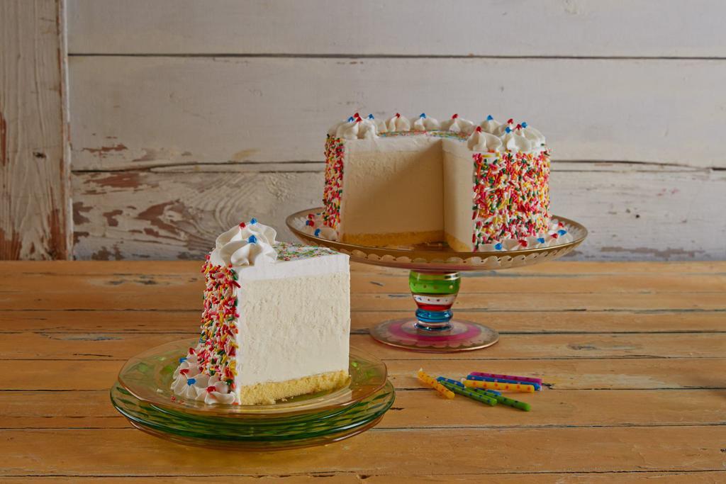 Sprinkles Ice Cream Cake · We DO NOT DO Any Writing or Custom made cake for all order through Third Party Delivery.  

There’s gold at the bottom of this rainbow and it’s mouthwatering yellow cake with Vanilla Ice Cream. Then, it’s covered with rainbow sprinkles for a party on every plate.