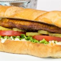Whiting Fish Sandwich · Served with tartar sauce, lettuce and tomato.