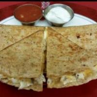 Quesadilla · Stuffed with cheddar and mozzarella cheese, served with salsa and sour cream. Add a chicken ...