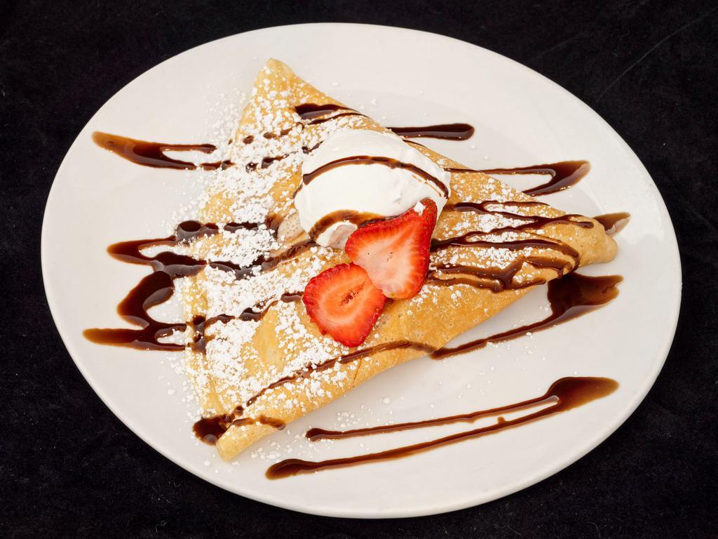 Strawberry Nutella Crepe · Fresh strawberry, Nutella, and chocolate syrup.