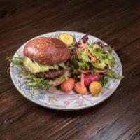 Impossible Burger (VG) · Tomato Jam, Avocado, Dressed Arugula and Vegan Garlic Mayo on a Rustic Bun. Served with Frie...