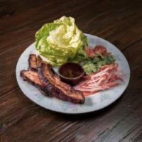 BBQ Pork Belly Lettuce Wraps · with Butter Lettuce, Choi's Kimchi, Pickled Carrots + Daikons, Cilantro + Gochujang