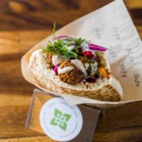  Falafel Pita (V) · 3rd generation recipe of ground chickpeas, herbs and spices.