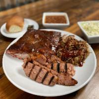BBQ Plate 2 Meat Lunch  · Your choice of two meats from sliced or chopped brisket, pulled pork, or smoked sausage topp...