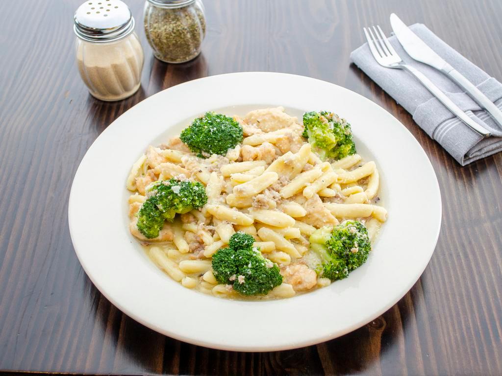 Country-Style Cavatelli · Cavatelli with chicken, crumbled wood-fired sausage and broccoli with garlic and extra virgin olive oil.