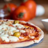 Serendipity Pizza · Gorgonzola, kalamata olives, prosciutto and arugula, finished with balsamic glaze.   