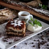 Homemade Tiramisu Lunch · Coffee soaked cake with chocolate and mascarpone cheese.