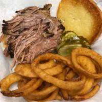 Huron River Pig · Our yummy pulled pork with thick applewood bacon, Dearborn ham American cheese, our Carolina...