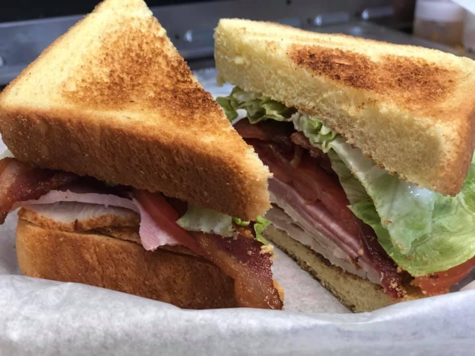 Club Sandwich · Turkey, ham, lettuce, tomato, bacon on Texas toast… yes, it is big!