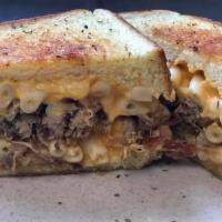 Sloppy Mac Sandwich · Mac and cheese, pulled pork and house BBQ sauce on grilled Texas toast.