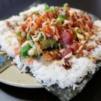 Long Ahi n Salmon Burrito · Tuna, salmon, rice, lettuce, onion, tomato, crab flake, seaweed salad, pineapple, edamame, s...