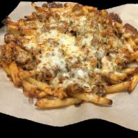 Buffalo Chicken Fries · Fries with buffalo chicken and pizza cheese melted on top. Salt and pepper.