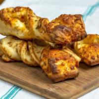 Garlic Parmesan Twists · Popular. Garlic parmesan twists are rolled fresh daily and baked to perfection with fresh ga...