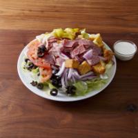 Antipasto Salad · Ham, salami, fresh crisp lettuce, Kalamata olives, shredded mozzarella cheese, tomatoes, red...