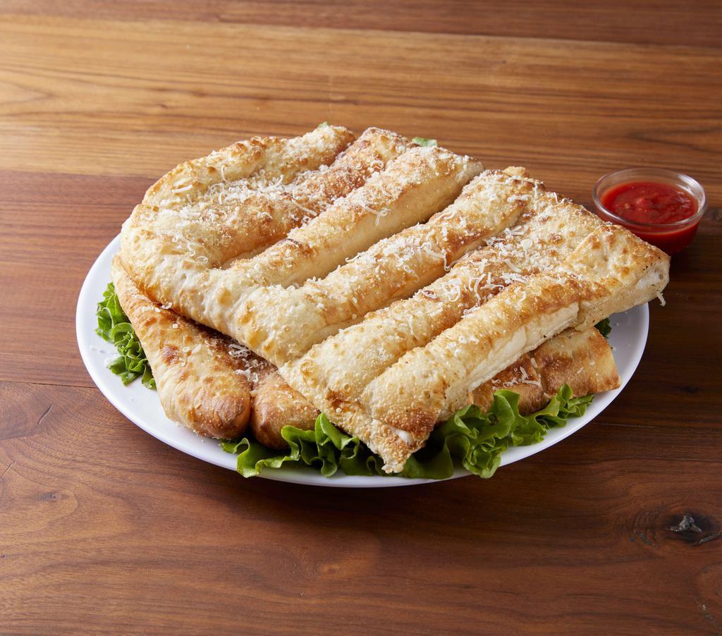 12 Piece Breadsticks · Hot buttered breadsticks, sprinkled with Parmesan cheese.