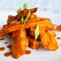 BBQ Sweet Potato Spears · Locally grown Hidden Streams sweet potato spears oven roasted and tossed in your choice of h...