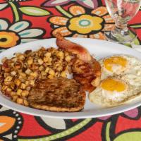 Eggs Americana Breakfast · 2 eggs, potatoes and sausage.