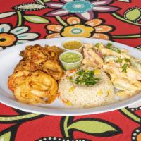 La Ceiba Platter · Signature grilled chicken with tomato and onion served with rice beans