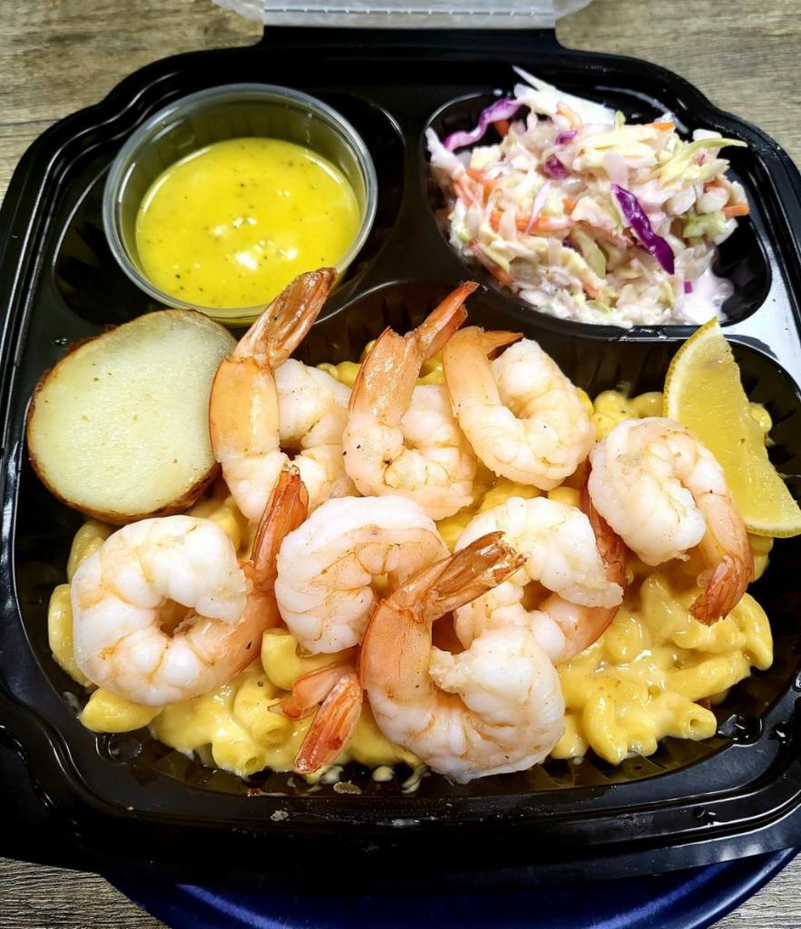 Boiled Shrimp Mac and Cheese Bowl · Boiled Peeled Shrimp with Special Creamy Cajun / lemon pepper sauce with Mac & Cheese Bowl
Serve with Potato  and Corn.