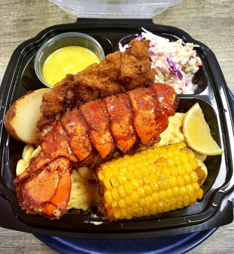 Golden Lobster Mac & Cheese Bowl · Deep-fried Lobster tail (4oz) with Special Creamy Cajun / Lemon Pepper Sauce on the Mac & Cheese Bowl.
Serve with Corn, Potato  and Sausage.