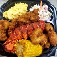 Golden Lobster & Shrimp Fried rice Bowl. · Deep-fried Lobster &  Shrimp with  Special Creamy Cajun / Lemon Pepper Sauce With Fried Rice...