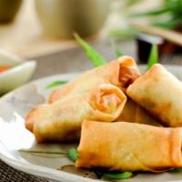 Veg Spring Roll · 4 pieces. Crispy pastry rolls with carrots, green onions, cabbage and bell peppers.