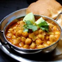 Channa Masala · Chick peas cooked with chopped ginger, garlic, onion and tomatoes.