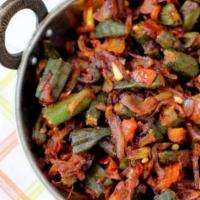 Bindi Masala · Fresh okra cooked with chopped onions, tomatoes, ginger and spices.
