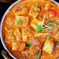 Kadai Paneer · Paneer cheese sauteed with bell peppers, onions and a blend of spices.