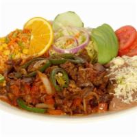 Bistec a la Mexicana · Steak Mexican style. Served with rice, beans and tortillas.