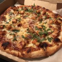 Carprese Pizza · Fresh Buffalo mozzarella, fresh garlic, fat tomato and basil.
