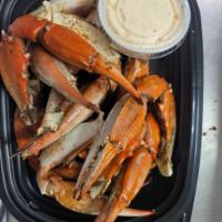 Blue Crab Claws · 10-12 blue crab claws served with our crab sauce.