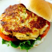 Crab Cake Sandwich · A 5 oz. crab cake served on a toasted bun with lettuce, tomato and a side of crab sauce. Ser...