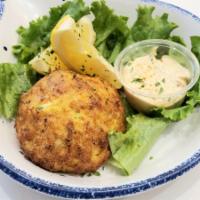 Crab Cakes · 1 or 2 crab cakes served with lemons and a side of our house made crab sauce.

