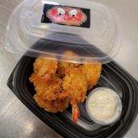 Fried Shrimp Appetizer · 6 pieces of panko crusted butterfly shrimp served with a house made tartar sauce.