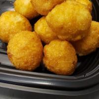 Hushpuppies · Hushpuppies air fried and served with our lemon garlic butter.