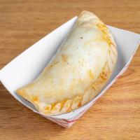 Argentinian Empanada · Argentinia. Spinach, meat, ham and cheese.