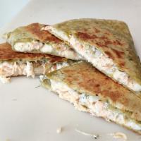 Greek Chicken Quesadilla · A spinach herb tortilla with fresh grated mozzarella, fresh diced onion, homemade tzatziki, ...