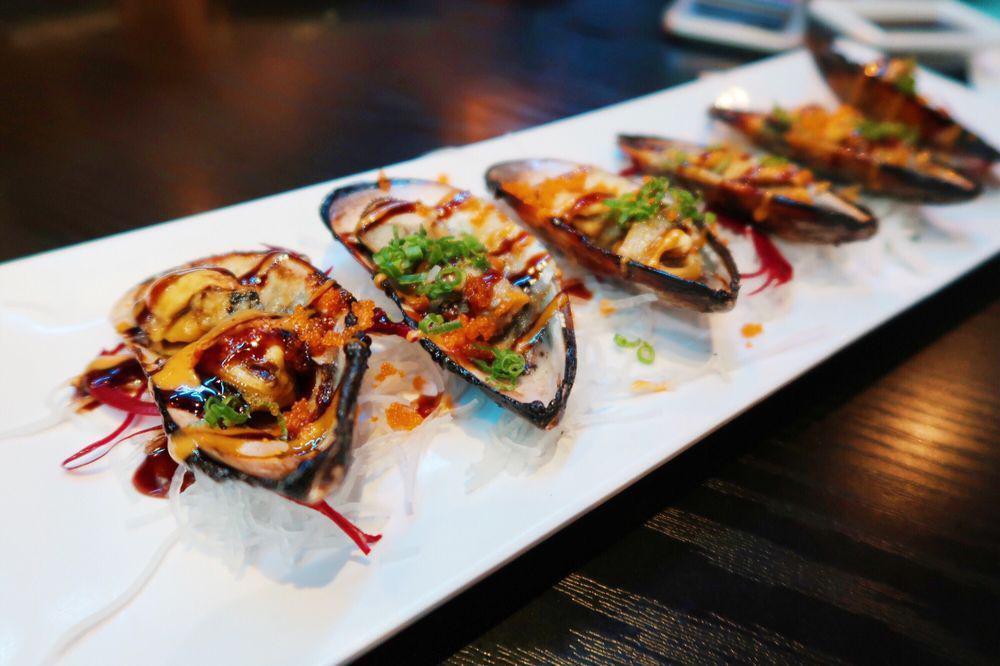 Baked Mussels On Half Shell · Baked green mussels with masago, green onion and eel sauce, spicy mayo.