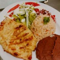 Pollo Asado · Grilled chicken breast served with house salad, rice, beans, and pico de gallo.
