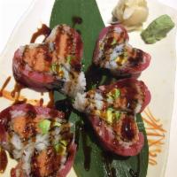 Love U Roll Chef's Special  · Spicy tuna and avocado inside, topped with tuna.