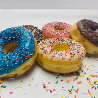 Fancy Donuts · Choose your favorite flavors. Color icing, sprinkles. If you would like multiples of a certa...