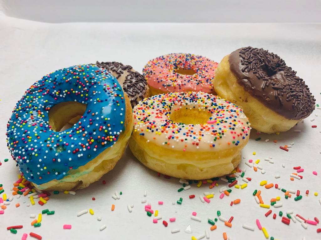 Fancy Donuts · Choose your favorite flavors. Color icing, sprinkles. If you would like multiples of a certain flavor, please include the quantity of each in the Special Instructions. 