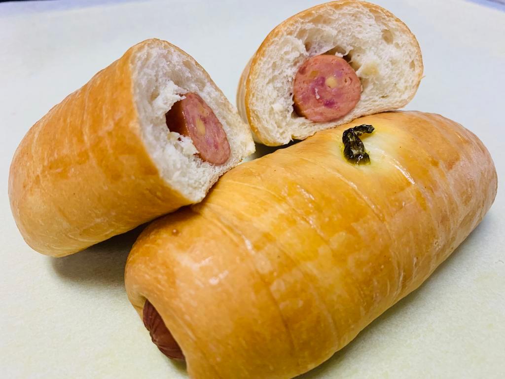 Small sausage and Cheeses Kolaches · Mixed pork and beef Meat sausage (like hot dog). If it's jalapeno option, it's jalapeno on top only; not inside. It always comes with cheese.