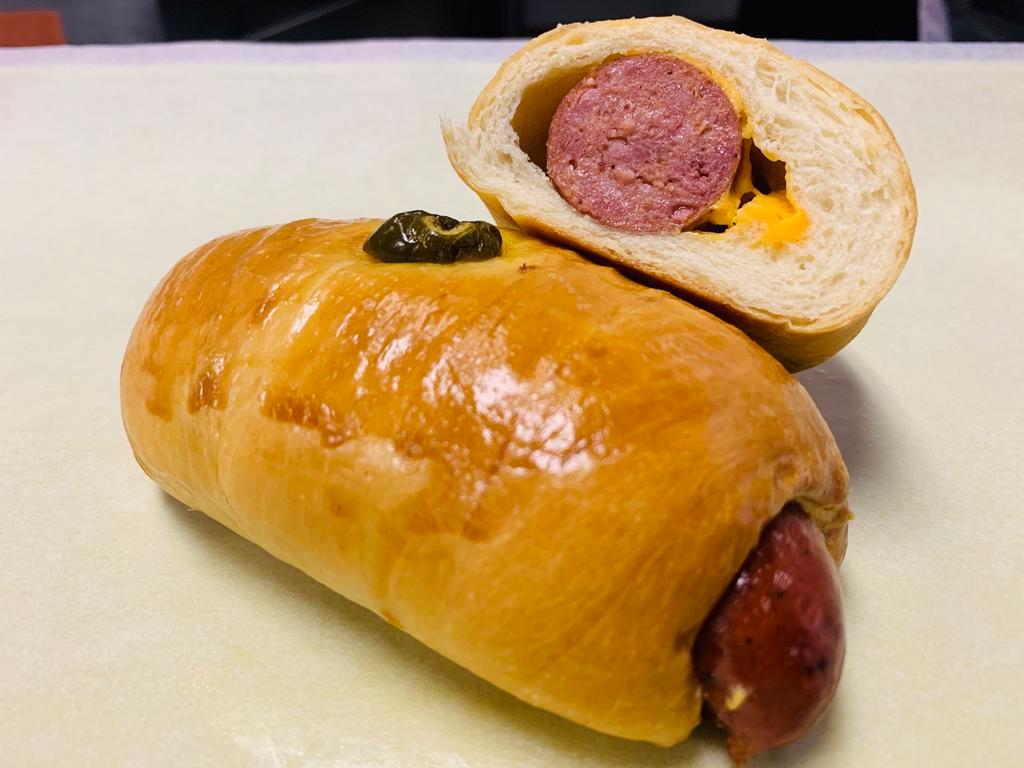 Smoked Sausage and Cheeses Kolache · Mixed pork and beef Meat sausage (like real sausage). If it's jalapeno option, it's jalapeno on top only; not inside. It always comes with cheese.