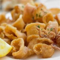 Calamares a la Andaluza · Crispy calamari, garlic and parsley aioli, lemon.