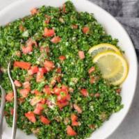13. Tabbouleh Salad · Parsley, tomatoes, onions, cracked wheat, lemon, olive oil, spice mix.