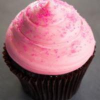 Pink Chocolate · Chocolate cake with pink buttercream frosting topped with pink sanding sugar.