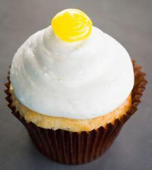 Lemon Drop Cupcake · Vanilla bean cake filled with lemon topped with lemon buttercream and lemon dollop.