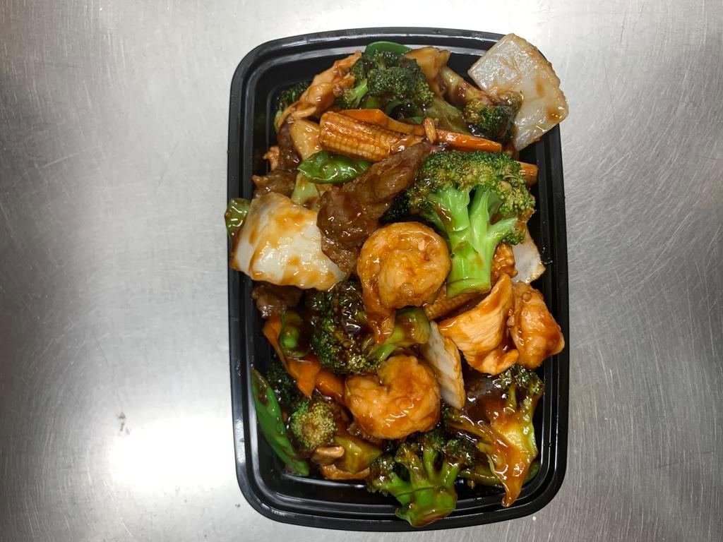 C15. Triple Delight · A delicious combination of jumbo shrimp, beef and chicken mixed with vegetable brown sauce.